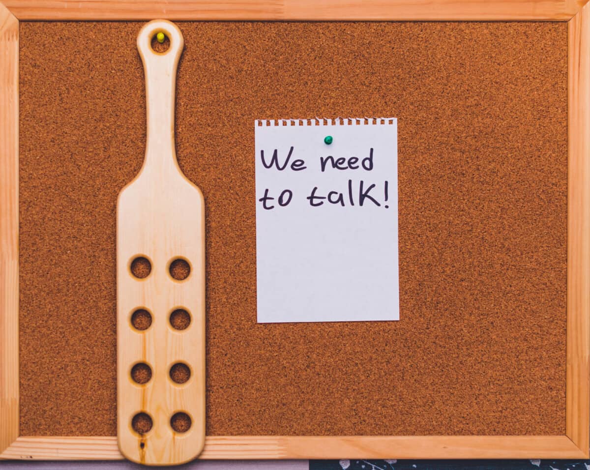 Board with a text: we need to talk!